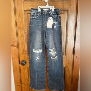 KanCan 90’s Flare Jeans With Holes Around the Knee